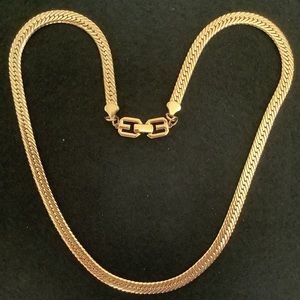 Vintage Givenchy gold tone herringbone necklace.